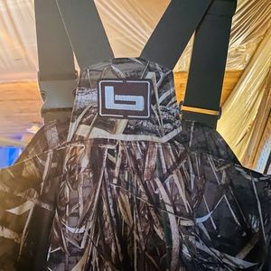 Men’s camo overalls with rubber waders. Sz 11 shoes xl in bibs.